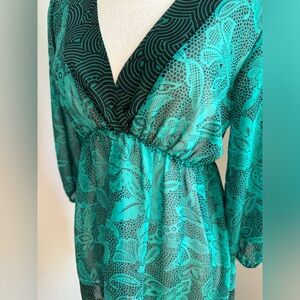 Vanity women’s swimsuit green and black cover up. Size small.